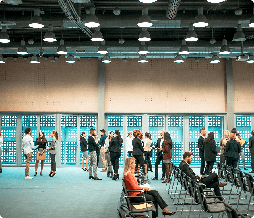 People networking in a conference hall
