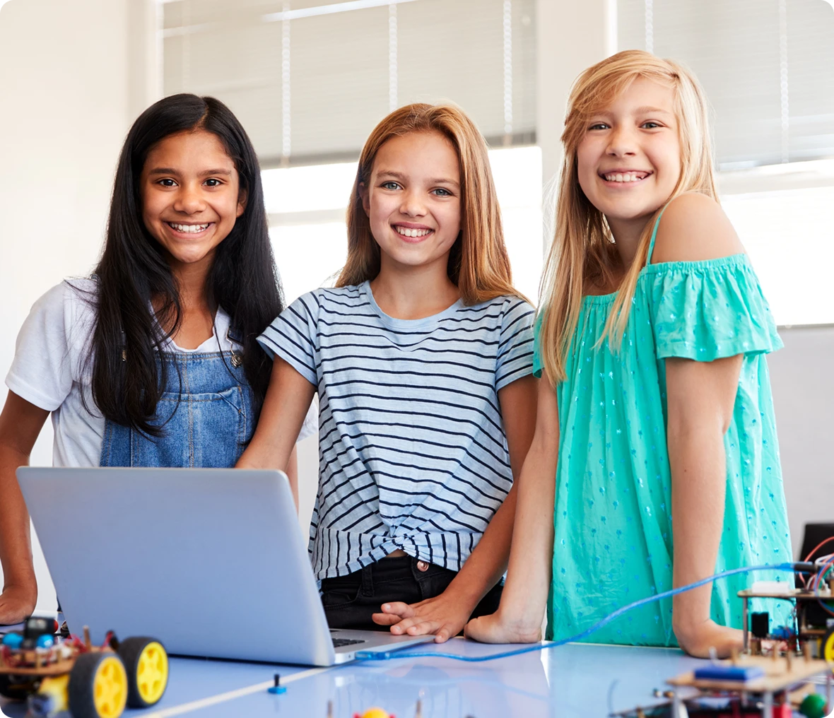 Happy kids in technology class