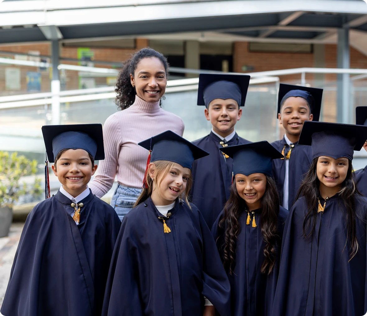 Group graduation photo with teacher