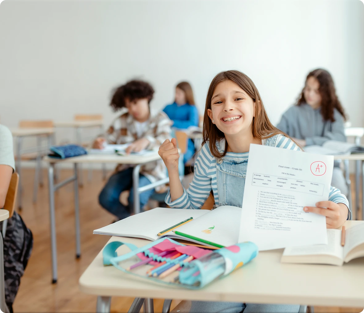 Happy student holding test result