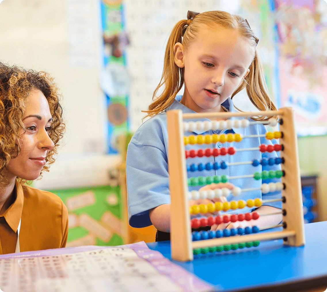 Young girl learning math with abacus