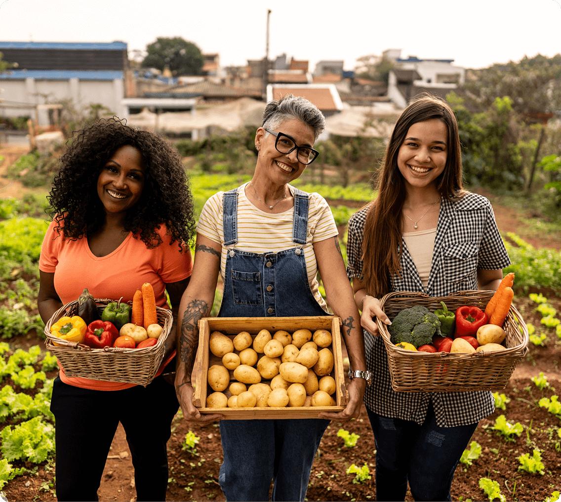 Smiling women with harvested produce
