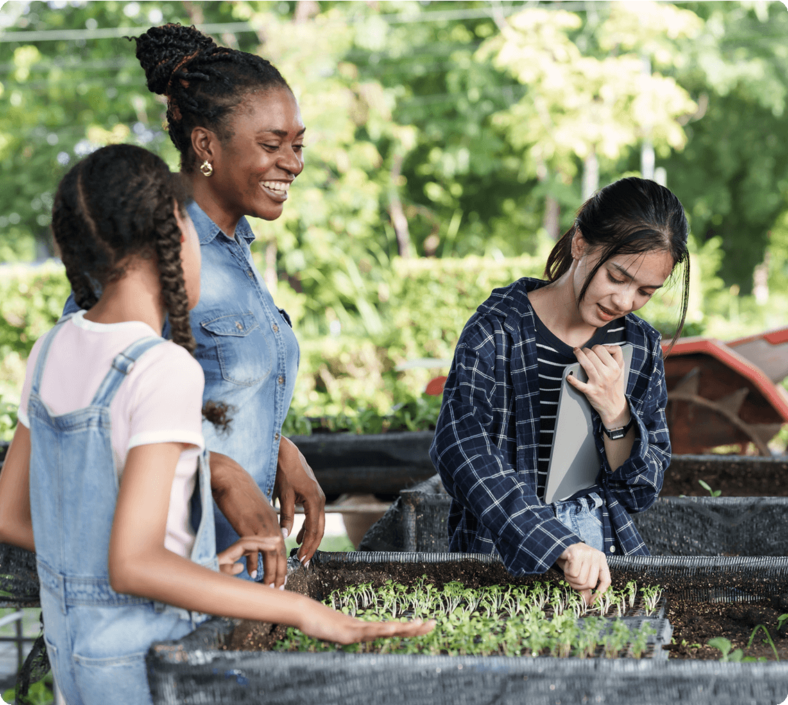 Group enjoying gardening activity outdoors