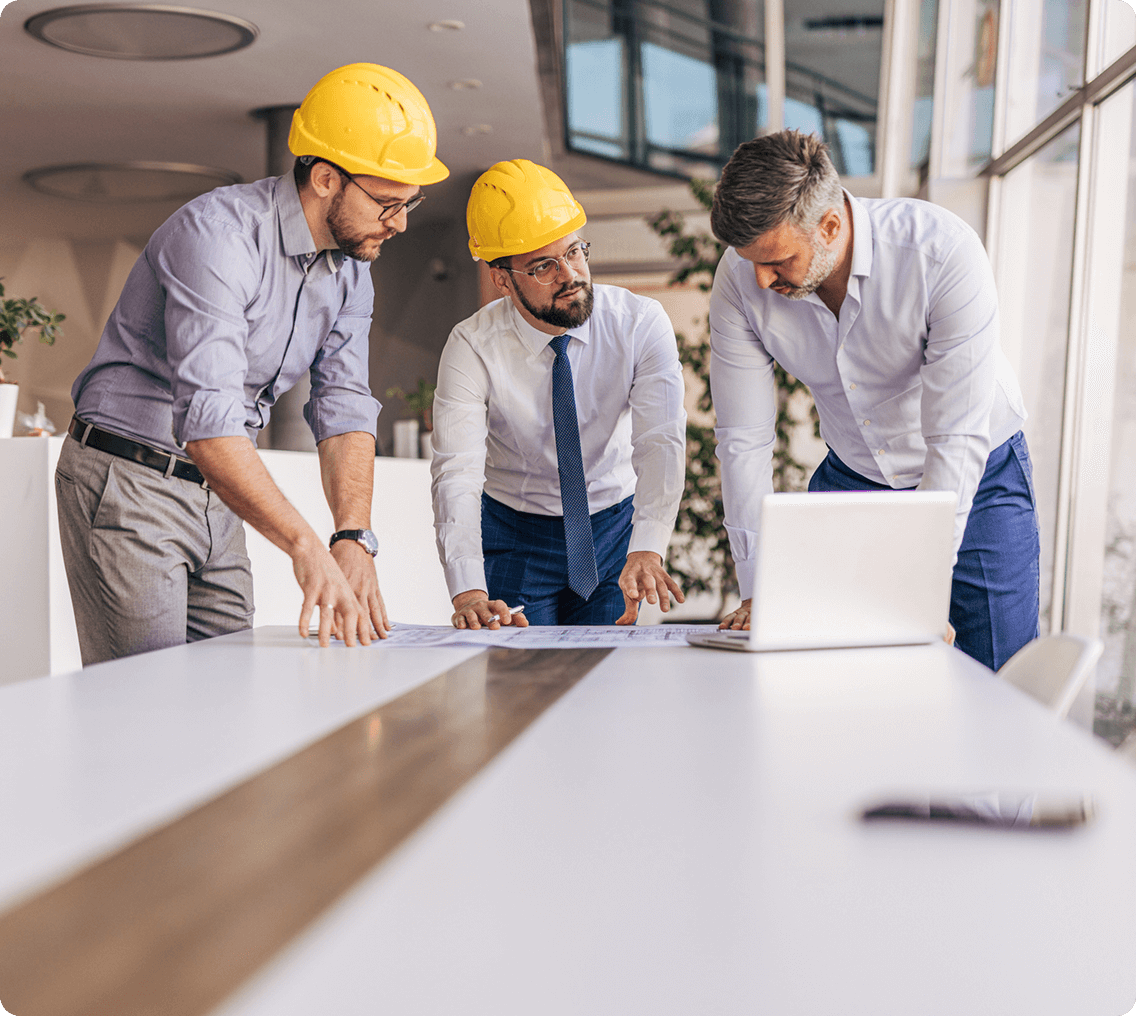 Construction team reviewing project plans