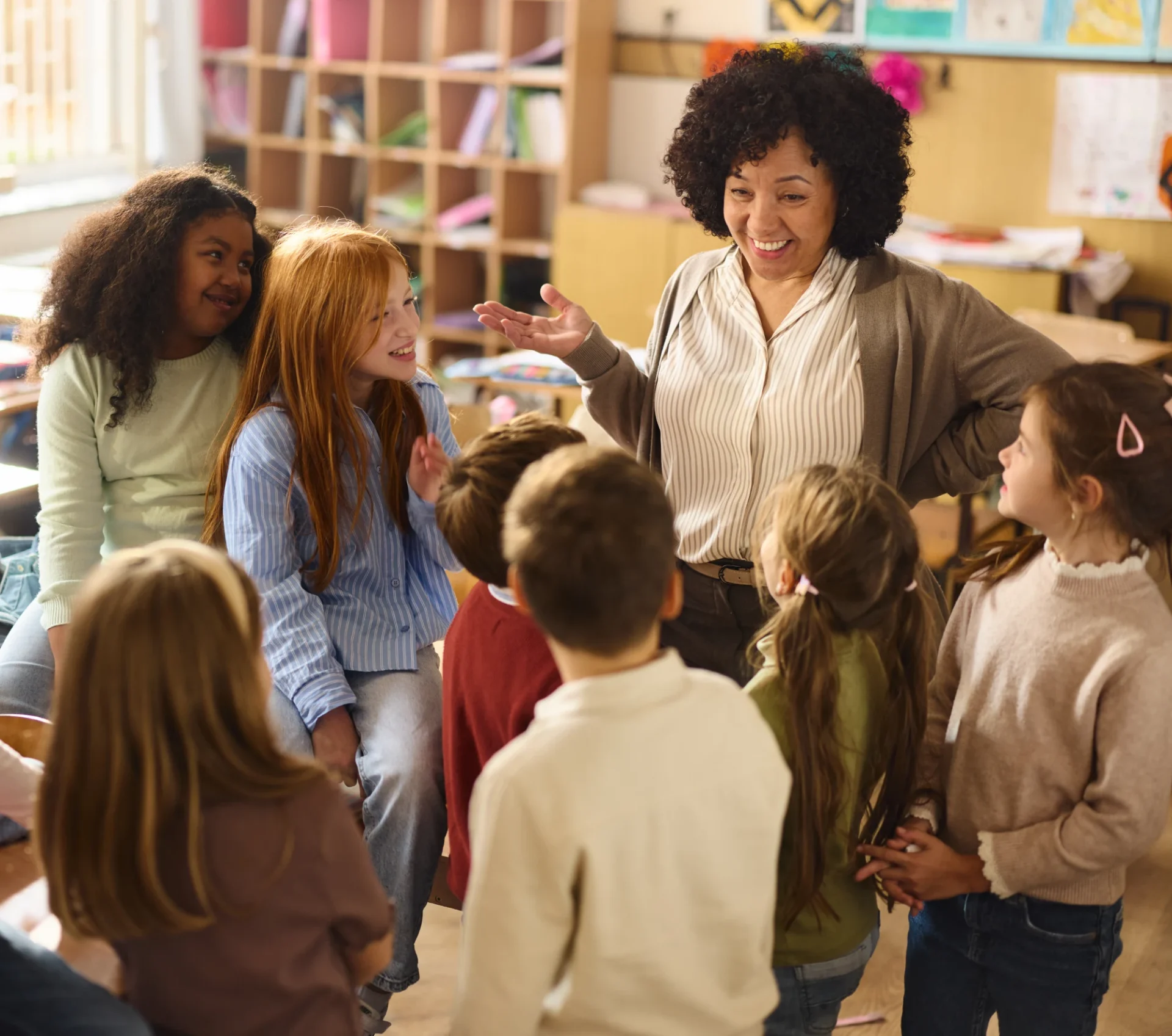 Classroom discussion with smiling children
