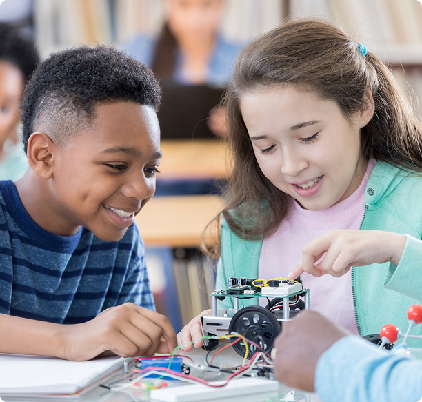 Kids collaborating on robotics project