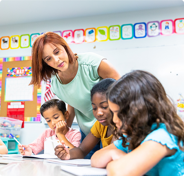Children learning with teacher assistance