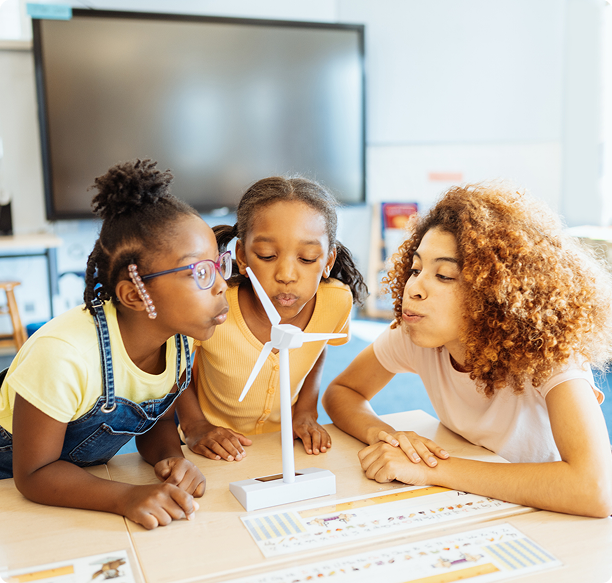Young students exploring renewable energy concepts