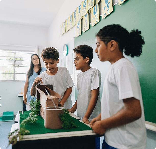 Kids showcasing a model in class