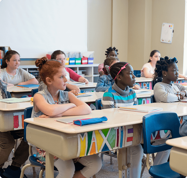 Diverse students seated at desks
