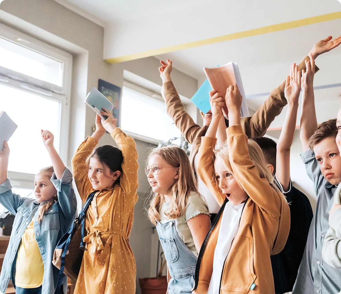 Excited kids participating in class activity