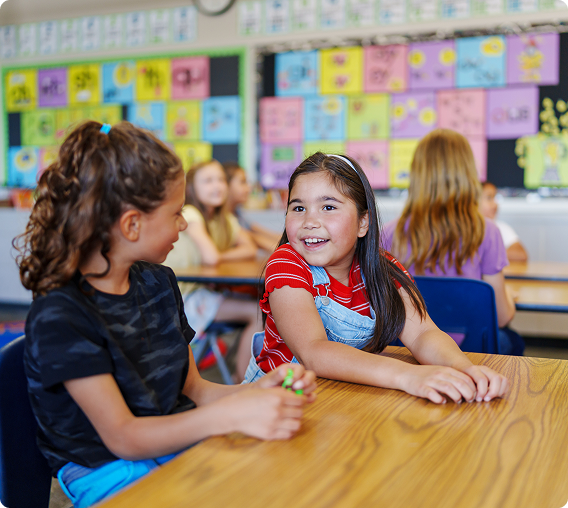 Students chatting in a lively classroom